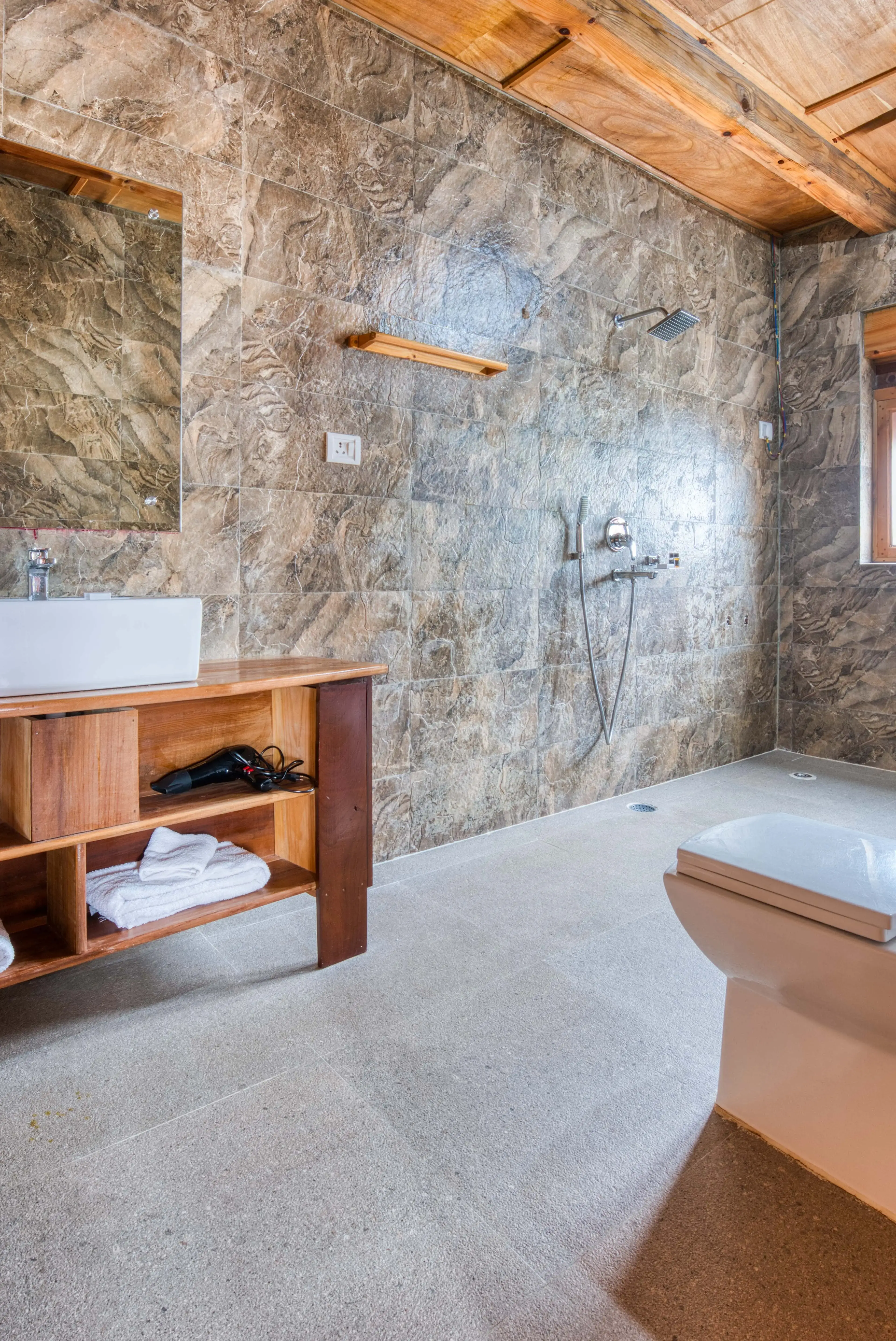 Bathroom in Room 202 featuring the sink and toilet pot