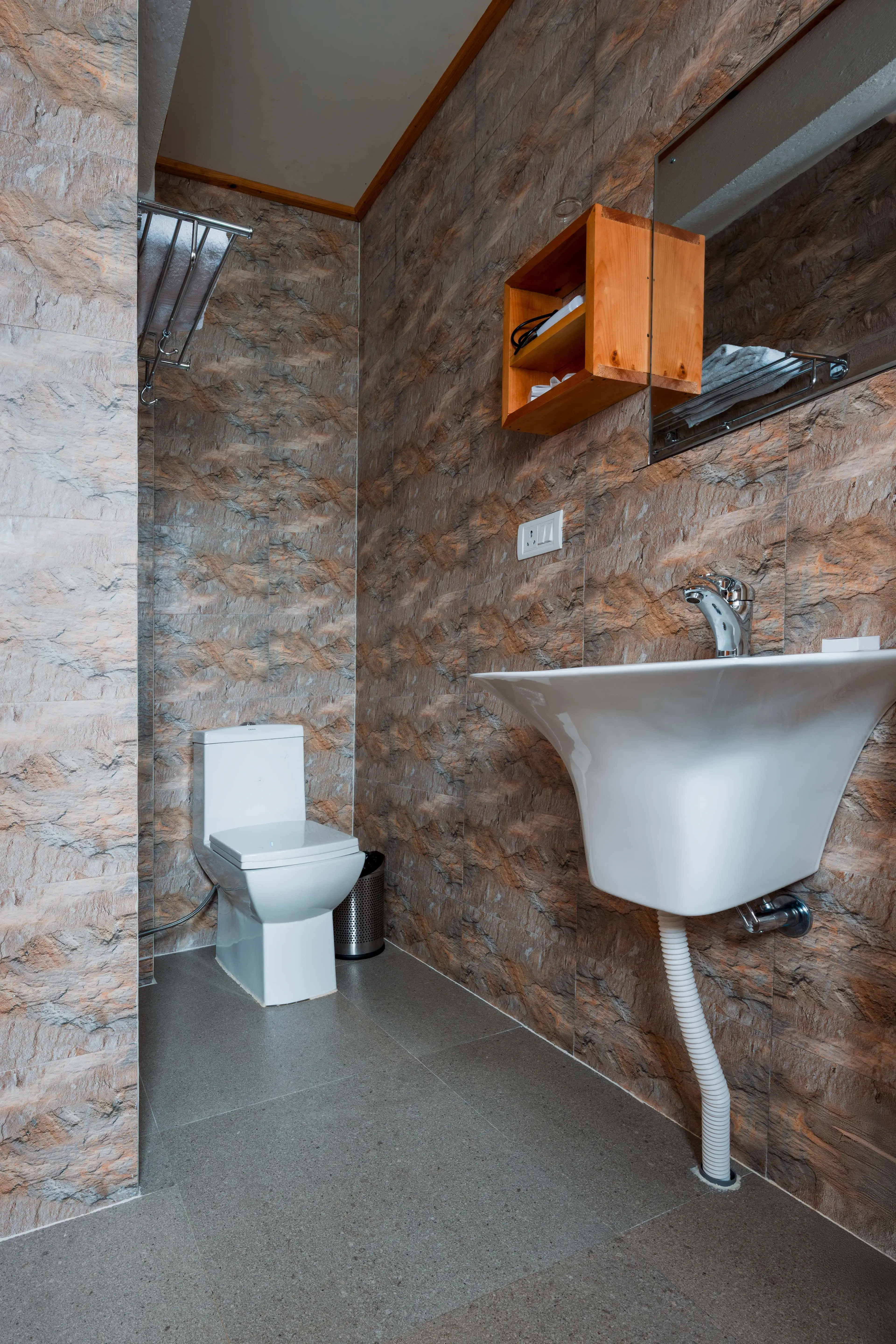 A shot of the bathroom in room 207 with pot and the sink